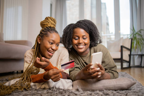 istock Girls shopping online 1490634446