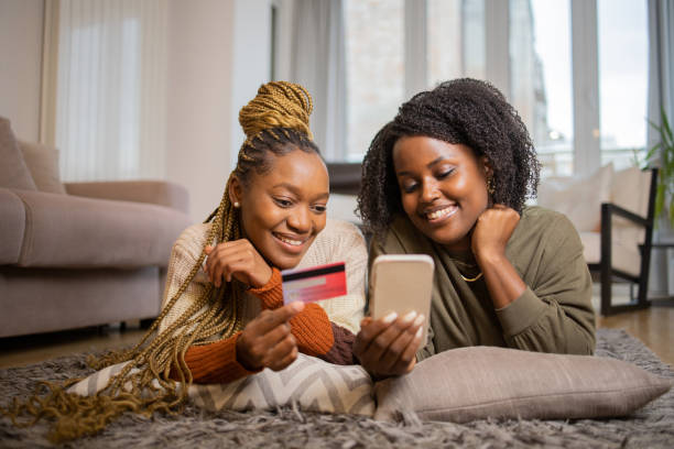 istock Girls shopping online 1490634450