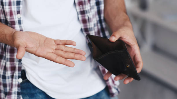 istock Money loss no savings bankrupt man empty wallet 1490634619