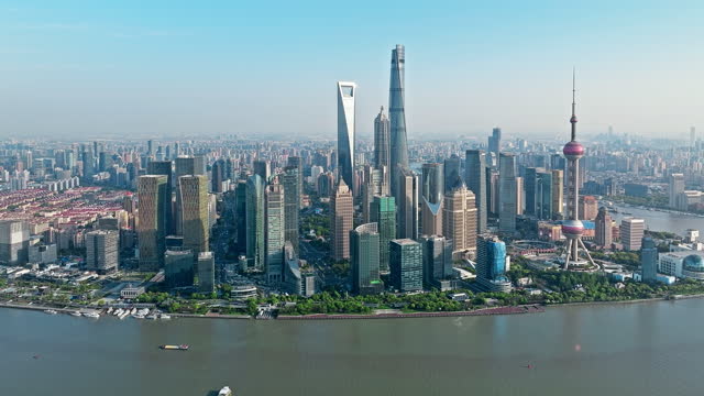 Aerial footage of city skyline and modern buildings in Shanghai, China.