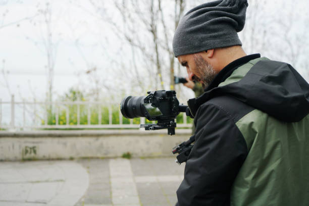 istock Gimbal stabilizer with mirrorless digital camera anti shake for video production cinematography 1490635330