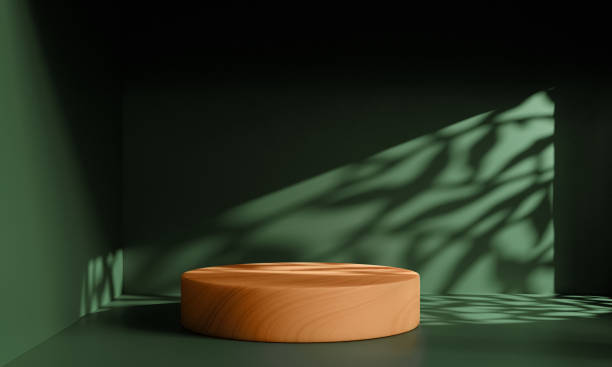 istock 3D Wooden podium display with leaf shadow. Studio room with green wall. Cosmetics or beauty product promotion mockup. Luxury architecture interior aesthetic design. Natural background. 3D Rendering 1490636122