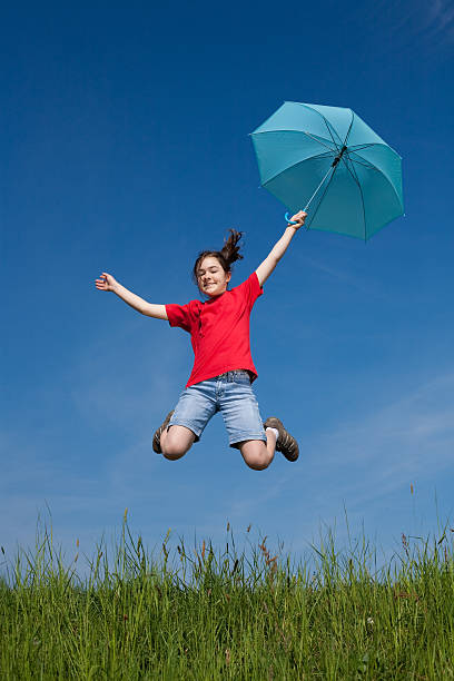 istock Girl jumping outdoor 149063669