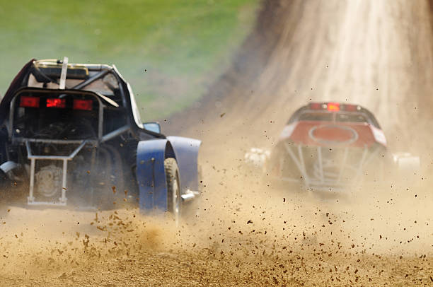 Two cars racing in a dirt road More Buggy  rally car racing stock pictures, royalty-free photos & images