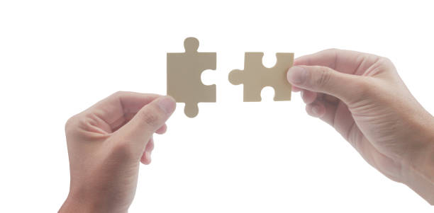 istock Connecting jigsaw puzzle. Business solutions success 1490637881