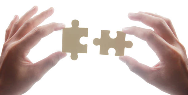 istock Connecting jigsaw puzzle. Business solutions success 1490637913