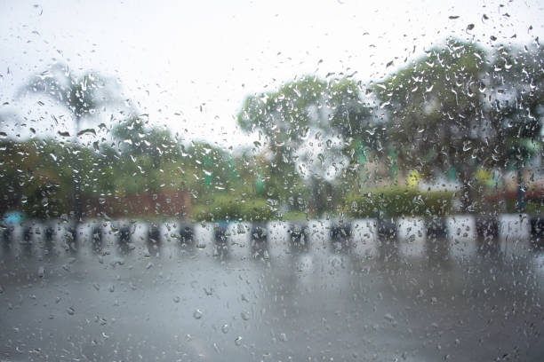 istock defocused photo behind a glass window exposed to raindrops 1490638139