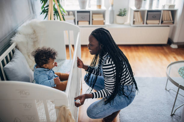 istock Mom playing with her baby 1490639803