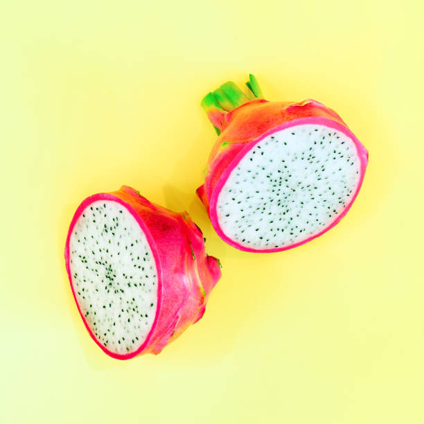 istock Dragon fruit or pitaya pieces on yellow background 1490640433