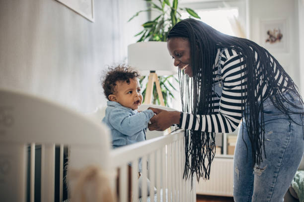 istock Mom playing with her baby 1490643287