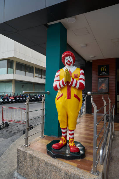 Ronald McDonald statue greeting customers in Pattaya. stock photo