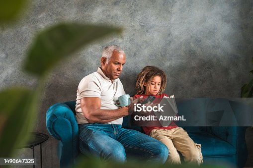 istock Father and Son Enjoying Quality Time Together 1490647325