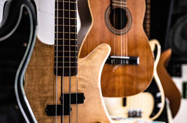 istock Bass guitar fretboardsand strings in music recording studio 1490648579