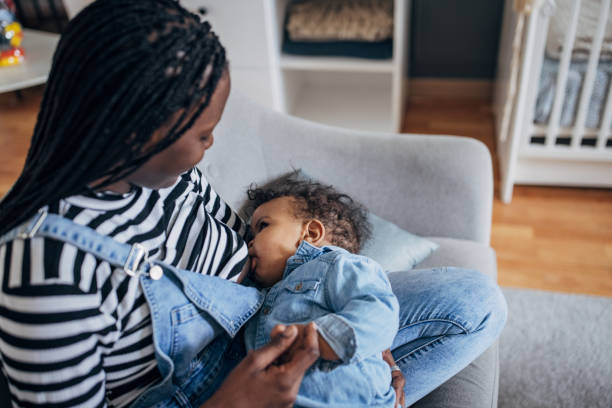 istock Mother breastfeeding baby at home 1490649650