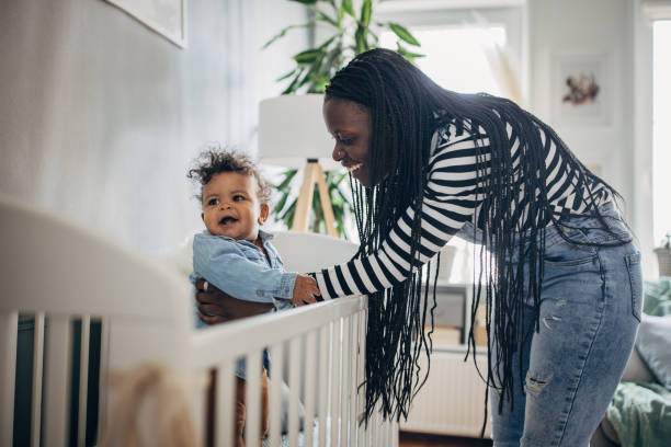 istock Mom playing with her baby 1490651715
