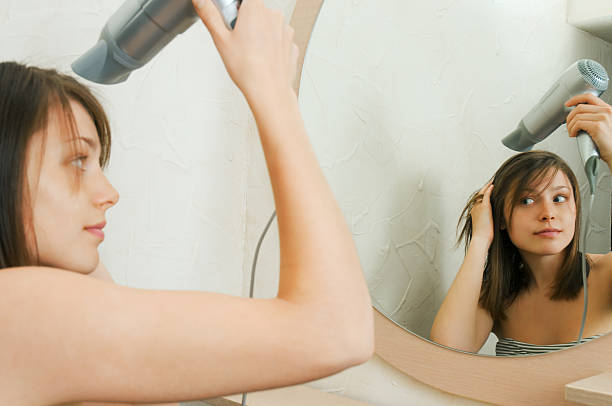 istock Woman drying hair 149065191