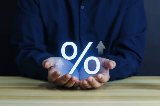 istock interest rate symbol on businessman hand 1490654280