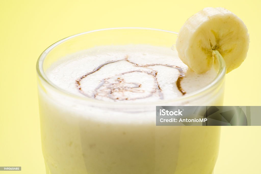 fresh fruit milk shake banana and caramel fresh fruit milk shake banana and caramel isolated Banana Stock Photo