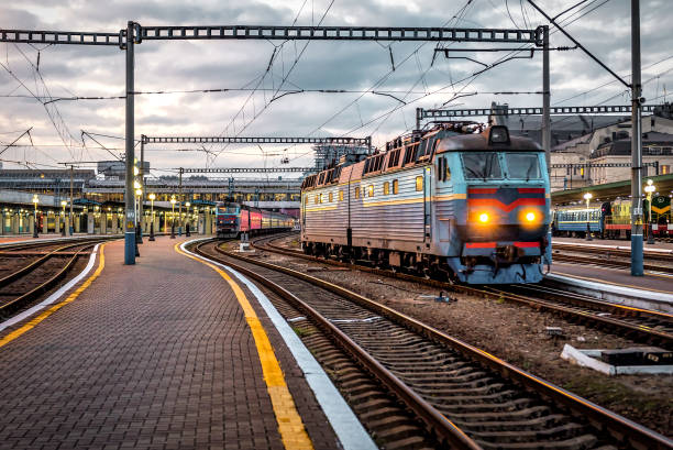 istock Two electric locomotive moving down a railway line 1490655163