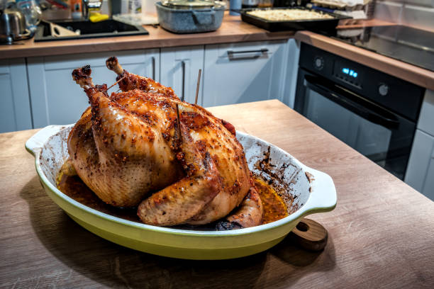 istock Whole tasty roasted turkey chicken on the kitchen table 1490656866