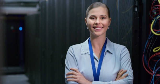 istock Portrait, woman and technician in a server room for cloud computing or cyber security at night. Tech, face of it engineer person working on database for maintenance or networking in data center 1490657559