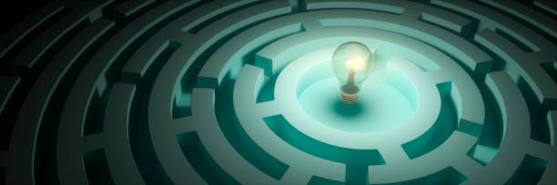 istock Light bulb at the centre of a maze 3d render 1490657792