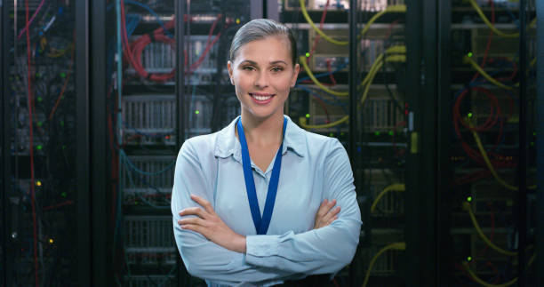 istock Portrait, woman and technician in a server room for cloud computing or cyber security at night. Tech, face of it engineer person working on database for maintenance or networking in data center 1490657859