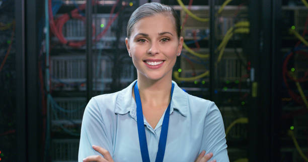 istock Portrait, woman and technician in a server room for cloud computing or cyber security at night. Tech, face of it engineer person working on database for maintenance or networking in data center 1490657902