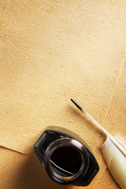 istock Old blank paper and quill pen 149065806