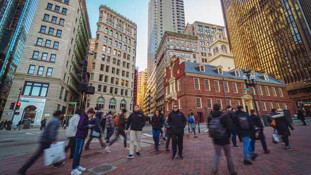 Time lapse of Crowd pedestrian and business tourist walking and crossing street intersections at Boston Old State House in Massachusetts, Boston, United States