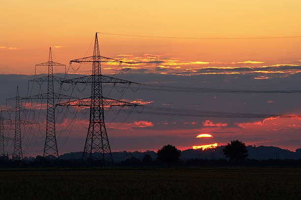 Sunset and pylons stock photo