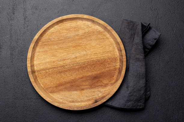 istock Wooden cutting board and kitchen towel 1490667206