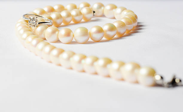 istock Pearl Necklace and diamond ring (Front view) 149066726