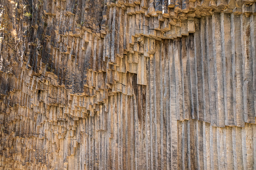 Basalt columns in Garni Gorge, know as Symphony of Stones in Armenia. Geological formation of octagonal basalt columns .