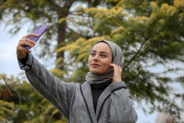 istock A hijab woman is taking a selfie. 1490668547