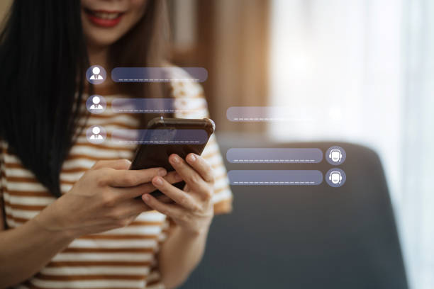 istock Woman online chatting with AI chat bot on smartphone. Artificial intelligence robot innovation technology communicate and answer questions with smart conversation and provide creative solution ideas. 1490668715