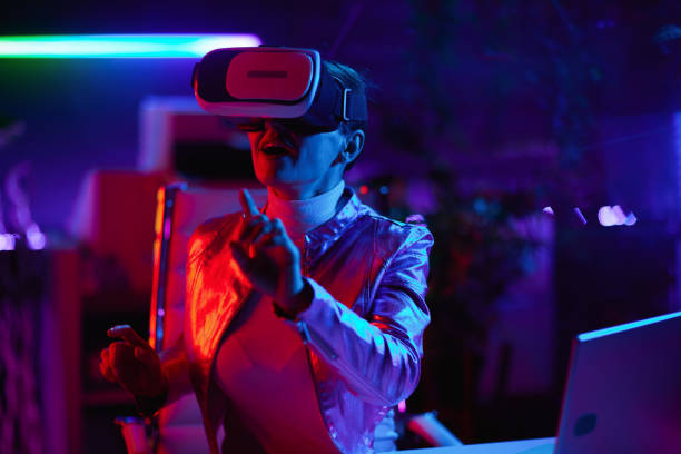 istock trendy female in vr headset in modern office 1490669419