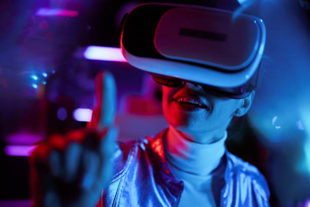 istock happy trendy woman in vr headset exploring metaverse 1490669477
