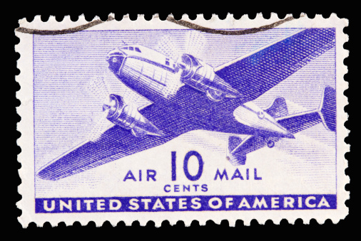 A 1941 issued 10 cent United States airmail postage stamp showing Transport Plane.