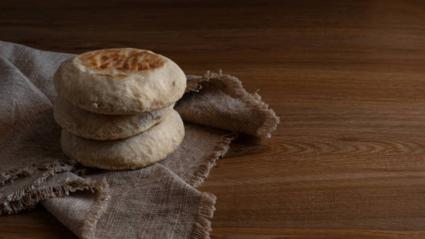 istock Stack of Portuguese breads Bolo Do Caco. 1490670778
