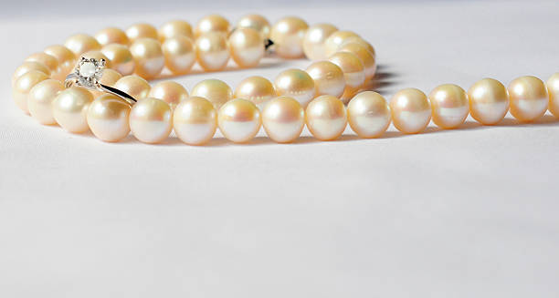 istock Pearl Necklace and diamond ring 149067171