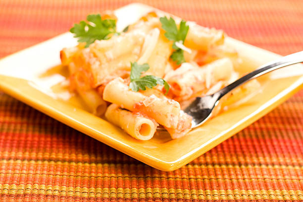 Baked Ziti on Square plate stock photo