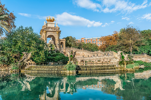 Cascada fountain in Ciutadella Park on a sunny autumn day in Barcelona, Spain. Sculptural composition with a waterfall by Josep Fontsere, 1888