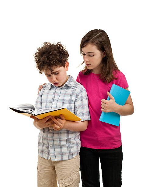 istock Kids reading book isolated on white background 149068041