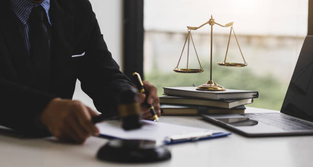 istock Attorney working on a desk in a law firm. 1490681052