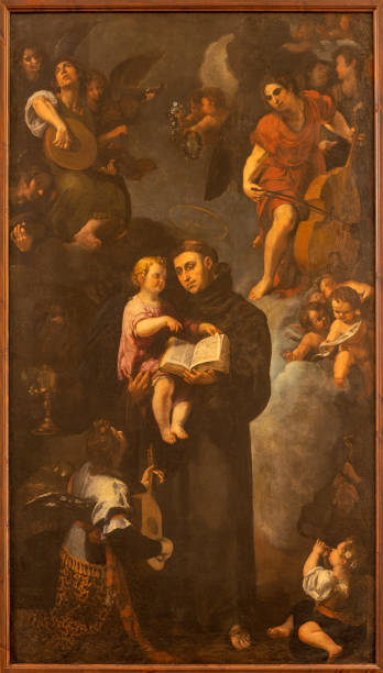 Valencia - The painting of St Anthony of Padua among the angels in the church Iglesia de San Lorenzo Valencia - The painting of St Anthony of Padua among the angels in the church Iglesia de San Lorenzo by unknown artist. st anthony of padua stock pictures, royalty-free photos & images