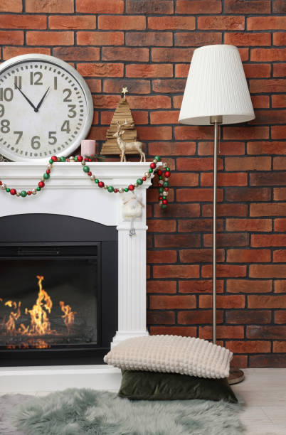 istock Modern fireplace decorated for Christmas in living room 1490683099