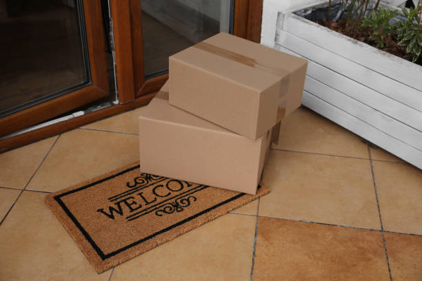 istock Parcels delivered on mat near front door 1490683291