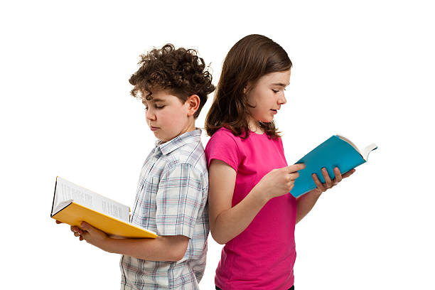 istock Kids reading book isolated on white background 149068563
