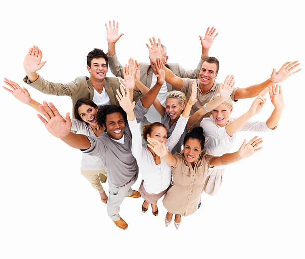 Happy business colleagues with hands raised